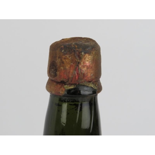 221 - A vintage bottle of F Chamisso Filho & Silva porto, dated 1851.
Condition report: Some age related e... 