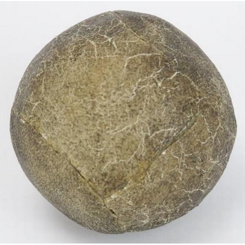 23 - An antique feather golf ball, 19th century. Stitched leather exterior. 4.6 cm diameter.
Condition re... 