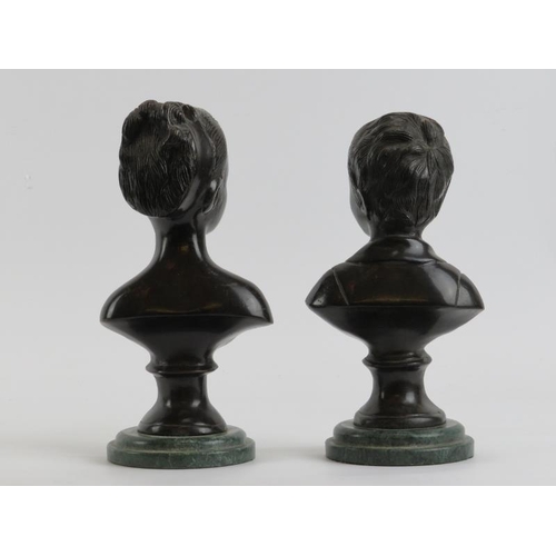 241 - A pair of patinated bronze busts of a boy and girl after Jean-Antoine Houdon, 20th century. Mounted ... 