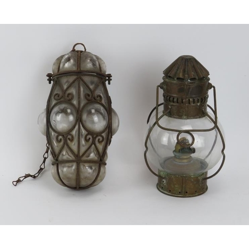 246 - A Venetian wrought iron and glass lantern and a hanging brass oil lamp by Sherwood of Birmingham, ea... 