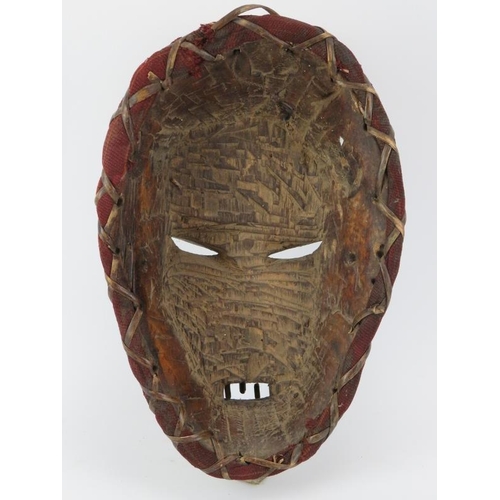 256 - Tribal Art: A West African carved and painted wood mask, possibly Ivory Coast. 42 cm height. 

Condi... 