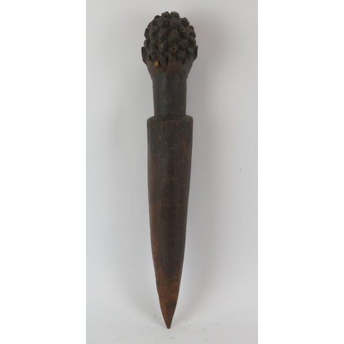 261 - Tribal Art: A West African carved wood figural peg or possibly sceptre. Formed as tusk mounted with ... 