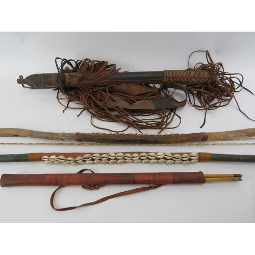 264D - Tribal Art: Two African bows and two sheaths with arrows. 116.5 cm longest length.

Condition report... 