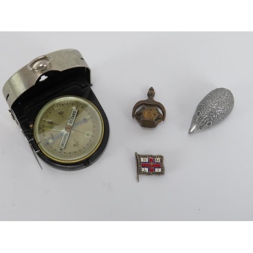 285A - An enamelled silver and marcasite RNLI brooch, a Victorian revolving seal, a German ‘Richting’ Bezar... 