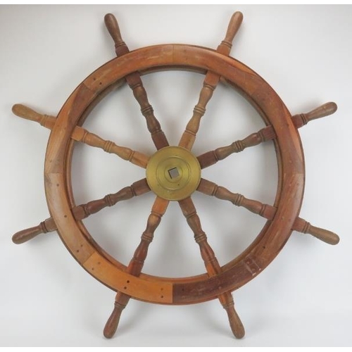 29 - Maritime: A large oak and brass eight spoke ship’s wheel, probably late 19th/early 20th century. 107... 