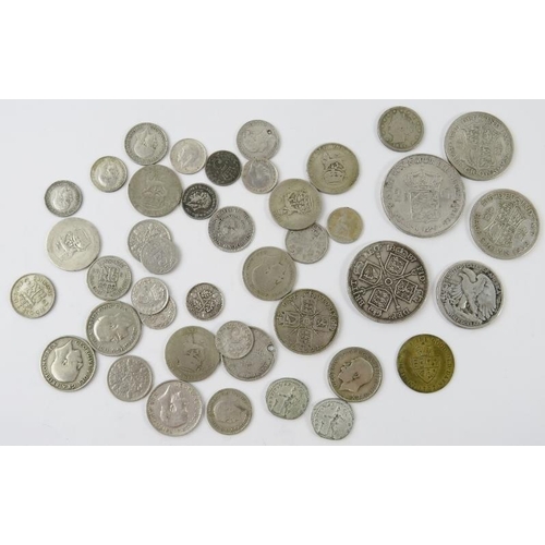 301 - A quantity of mainly British, Dutch and US silver coins within a Damascene enamel decorated covered ... 