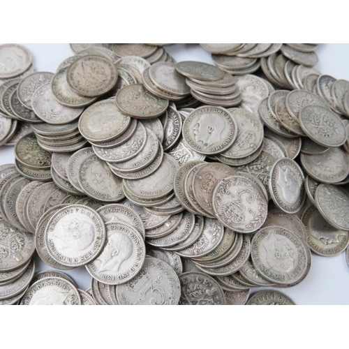 302 - A large quantity of silver threepence pieces from Queen Victoria to King George VI. Gross weight 614... 