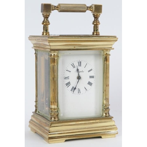 31 - A French Angelus eleven jewels brass carriage clock. Key included. 9 cm height.
Condition report: So... 