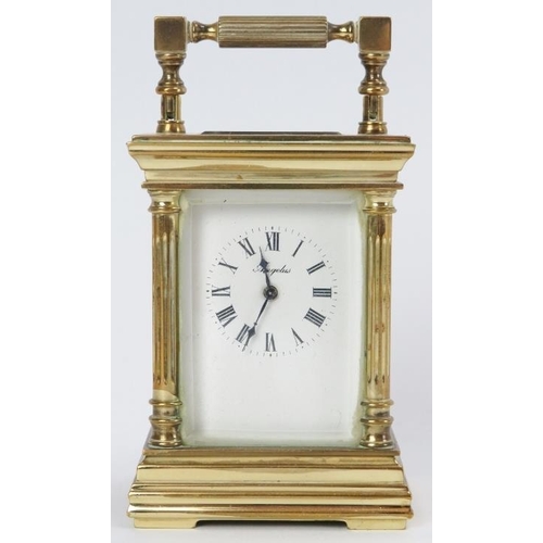 31 - A French Angelus eleven jewels brass carriage clock. Key included. 9 cm height.
Condition report: So... 