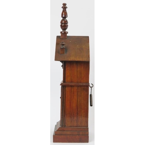 32 - A novelty mahogany clock tower mantle clock, late 19th/early 20th century. Key included. 36.7 cm hei... 