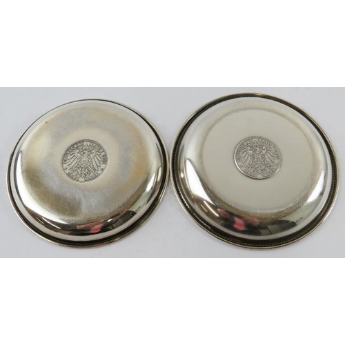 333 - Two German silver dishes with inset three Mark coins and beaded rims. Largest 12.5cm diameter. Combi... 