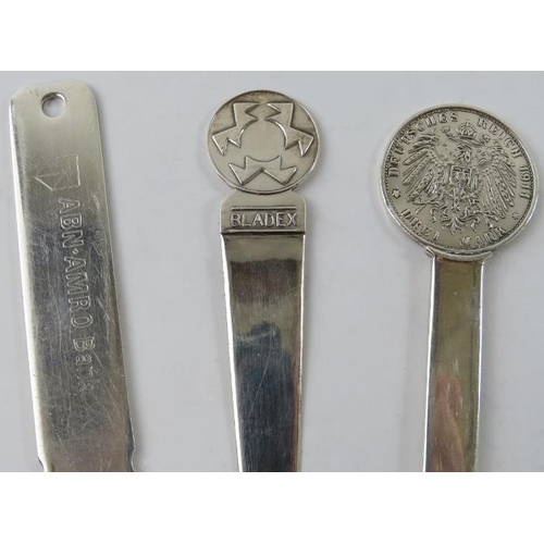 337 - Three white metal paperknives, one marked Peru 925 and a leaf shape dish marked 925. Gross combined ... 