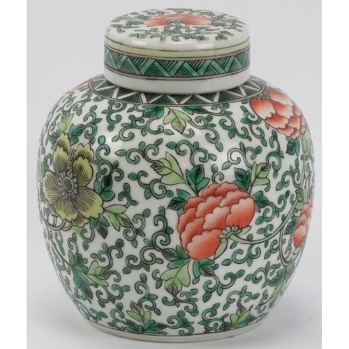 4 - A Chinese famille verte ginger jar, late 19th/early 20th century. Overglaze decorated with flowers a... 