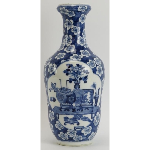 42 - A Chinese blue and white porcelain vase, 19th century. Decorated with ‘Hundred Antiques’ quatrefoil ... 