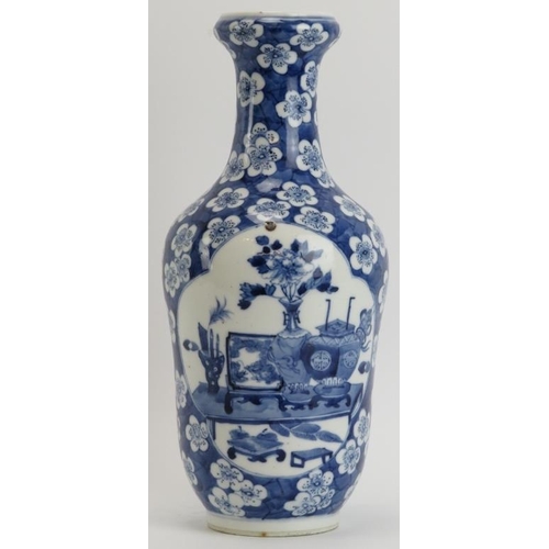 42 - A Chinese blue and white porcelain vase, 19th century. Decorated with ‘Hundred Antiques’ quatrefoil ... 