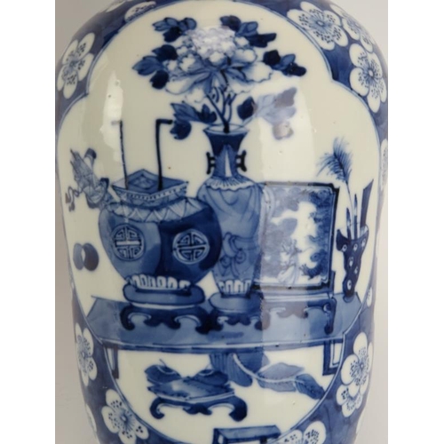 42 - A Chinese blue and white porcelain vase, 19th century. Decorated with ‘Hundred Antiques’ quatrefoil ... 