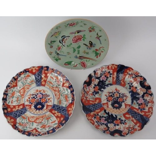 45 - A Chinese enamelled celadon plate, 19th century and two Japanese Imari scalloped plates, late Meiji ... 