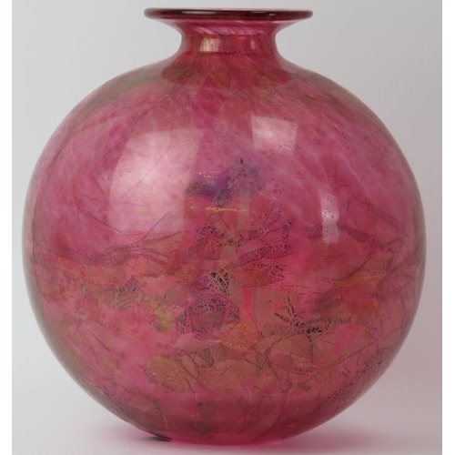 48 - A large Isle of Wight mottled red and aventurine glass vase. Of globular form with factory label ben... 