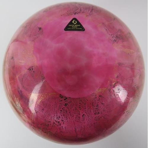 48 - A large Isle of Wight mottled red and aventurine glass vase. Of globular form with factory label ben... 