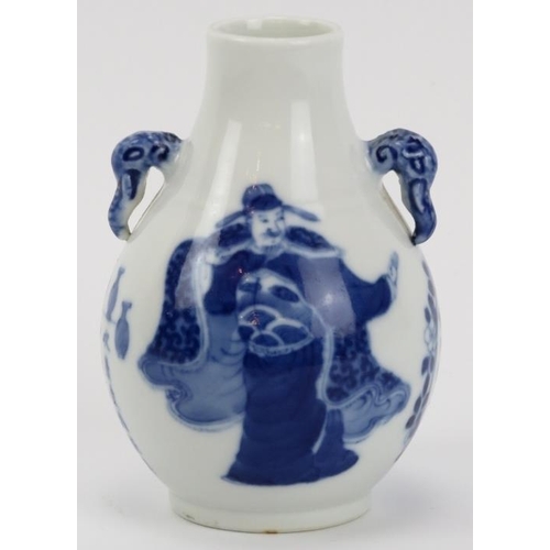 5 - A Chinese blue and white porcelain vase, 19th century. Of pear shaped form with elephant’s head twin... 