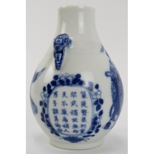 5 - A Chinese blue and white porcelain vase, 19th century. Of pear shaped form with elephant’s head twin... 