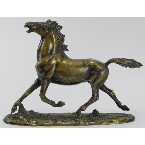 52 - A bronzed brass figure of a horse after Erich Saalmann, 20th century. Signed ‘E. Saalmann’ to the ba... 