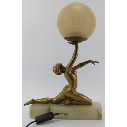 53 - A vintage Art Deco gilt spelter figural table lamp. Modelled as a female dancer holding a spherical ... 