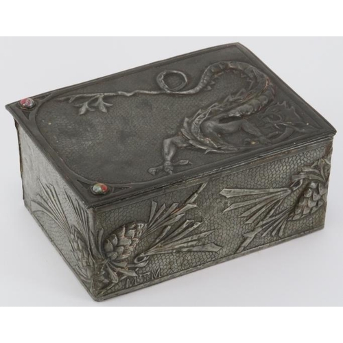 56 - A rare Arts & Crafts pewter trinket box, early 20th century. Decorated in repoussé with a dragon and... 