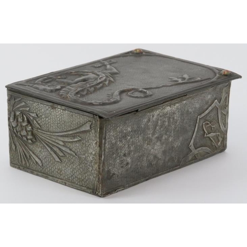 56 - A rare Arts & Crafts pewter trinket box, early 20th century. Decorated in repoussé with a dragon and... 