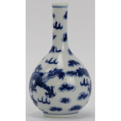 6 - A Chinese blue and white porcelain vase and two bowls, 19th century. (3 items) Vase: 13.3 cm height.... 