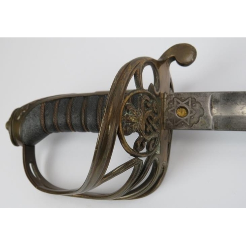 66 - Militaria: A Victorian Royal Marine Light Infantry officer’s sword. With a wire bound fish skin grip... 