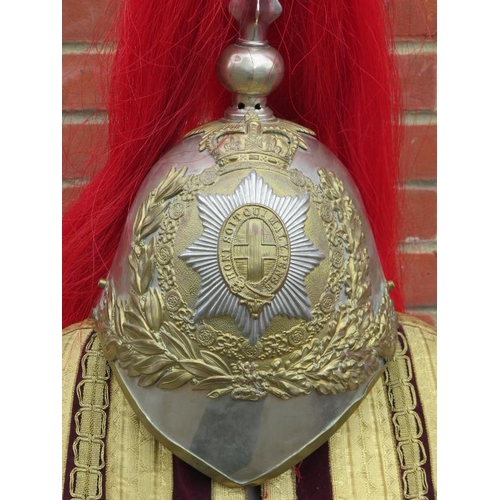 68 - Militaria: A British household cavalry helmet and formal state ceremonial tunic, 20th century. The b... 