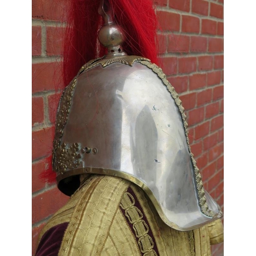 68 - Militaria: A British household cavalry helmet and formal state ceremonial tunic, 20th century. The b... 