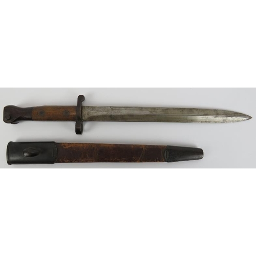 69 - Militaria: An 1888 pattern bayonet, late 19th/early 20th century. ‘M’ struck to the hilt. 44.2 cm to... 