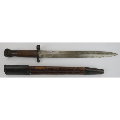 69 - Militaria: An 1888 pattern bayonet, late 19th/early 20th century. ‘M’ struck to the hilt. 44.2 cm to... 