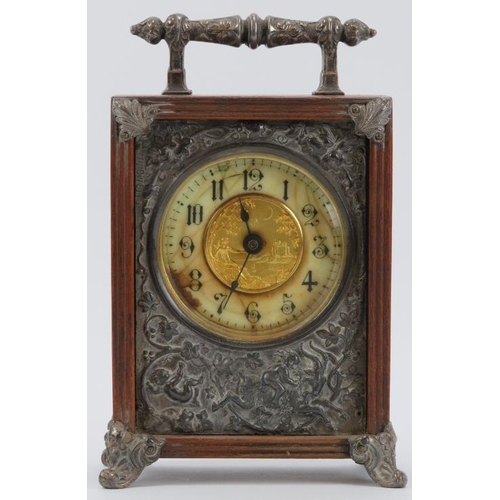 74 - A Victorian oak mantle clock, circa 1889. Design reg: 134844. With silver plated handle, embossed fr... 