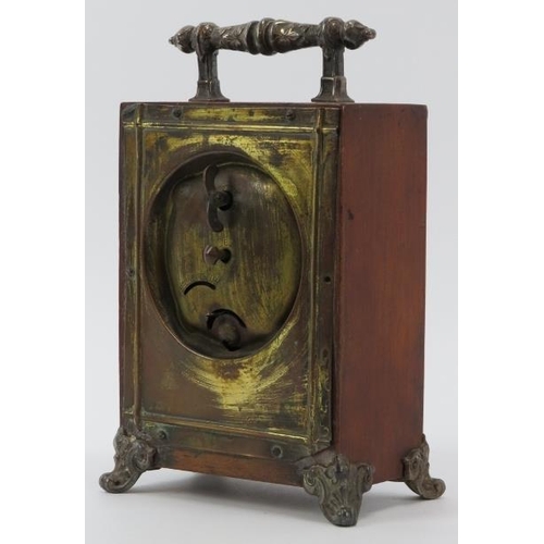 74 - A Victorian oak mantle clock, circa 1889. Design reg: 134844. With silver plated handle, embossed fr... 