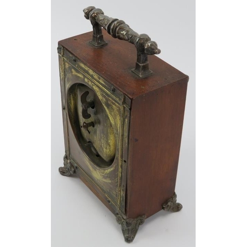 74 - A Victorian oak mantle clock, circa 1889. Design reg: 134844. With silver plated handle, embossed fr... 