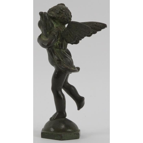 82 - An Italian bronze sculpture of a cherub carrying a dolphin after Andrea del Verrocchio, 19th century... 