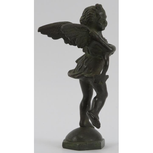 82 - An Italian bronze sculpture of a cherub carrying a dolphin after Andrea del Verrocchio, 19th century... 