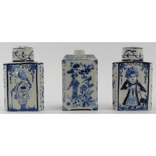 84 - Three Dutch Delft tea caddies, 18th/19th century. Comprising a pair of tea caddies with covers decor... 