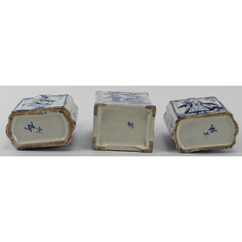 84 - Three Dutch Delft tea caddies, 18th/19th century. Comprising a pair of tea caddies with covers decor... 