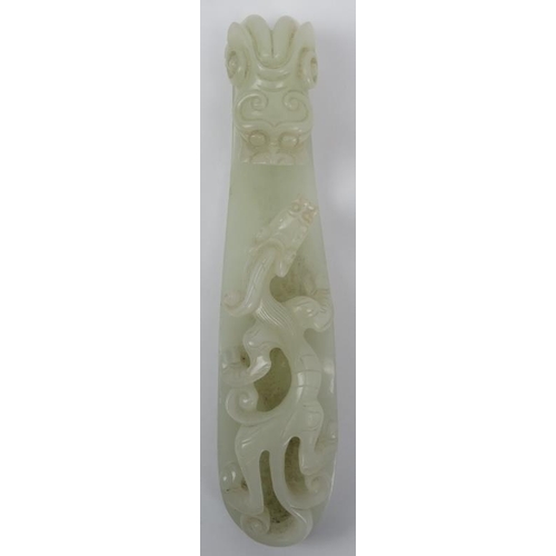 89 - A Chinese celadon jade dragon belt hook, 18th/19th century. Finely carved depicting a chilong dragon... 