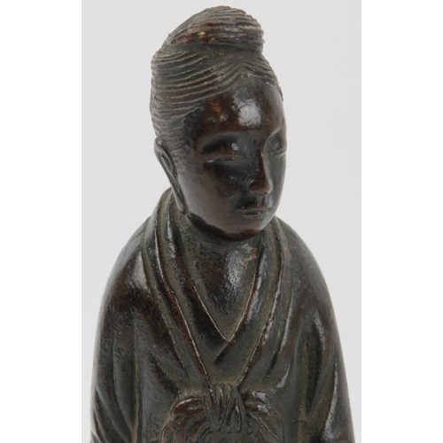 92 - A Chinese bronze figural statue, Qing dynasty. Possibly an interpretation of Lu Dongbin. 17.7 cm hei... 