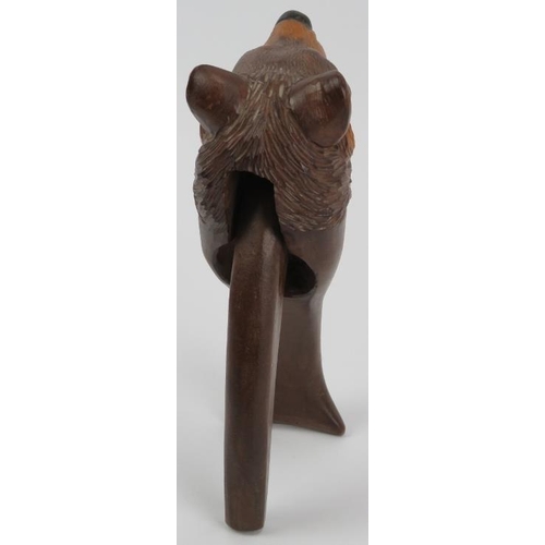 98 - A Black Forest carved wood bear’s head nutcracker. Bear with inset glass eyes. 18.5 cm length.
Condi... 