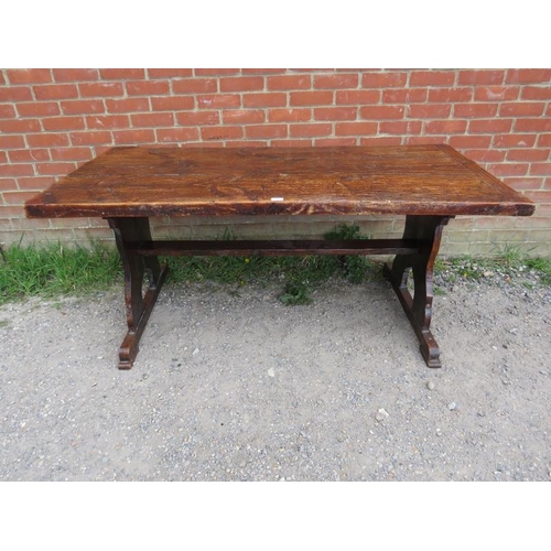 701 - A 19th century elm refectory table of excellent colour and patina, on stile end supports with middle... 