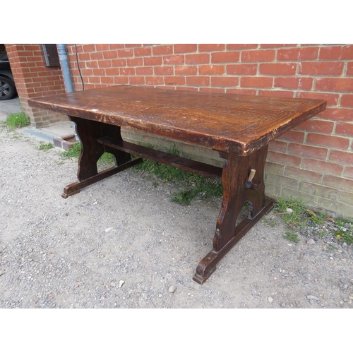 701 - A 19th century elm refectory table of excellent colour and patina, on stile end supports with middle... 