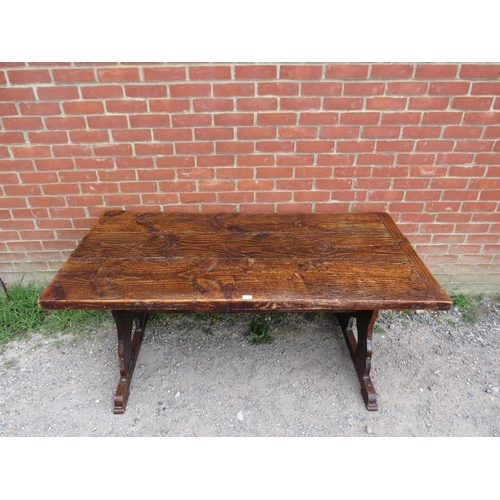 701 - A 19th century elm refectory table of excellent colour and patina, on stile end supports with middle... 