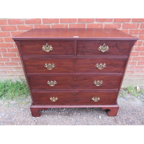 704 - A Georgian mahogany chest of good colour, housing two short above three long graduated cock-beaded d... 