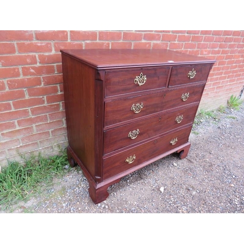 704 - A Georgian mahogany chest of good colour, housing two short above three long graduated cock-beaded d... 